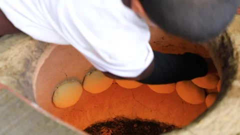 The man glues the dumplings to the wall Stock Footage 243629949
