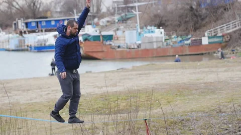 Man go slackline Stock Footage 60456366