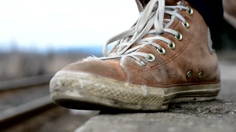 Man goes along the tracks on the platform Stock Footage 47609262