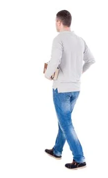 Man goes and has a stack of books Stock Photos