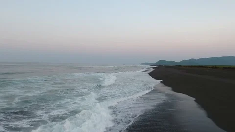 Man goes to the beach of the ocean. Stock Footage 104197451