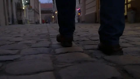 A man goes down the street Stock Footage 82728076