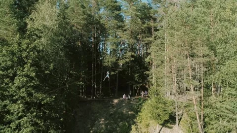 Man goes down the troll in the forest in a camp in nature2 스톡 동영상 134488815