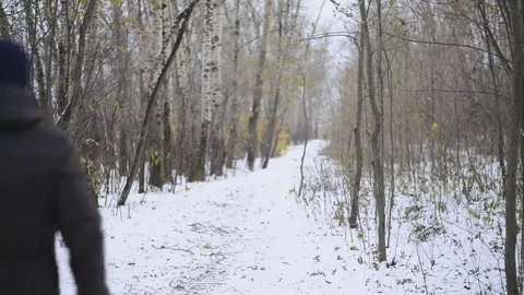 Man goes on a footpath in winter Stock Footage 69199276