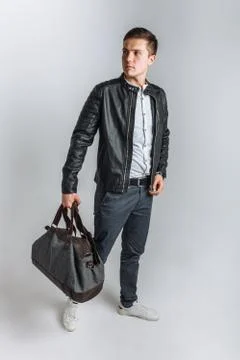 Man goes on a journey. The guy in the Studio. The guy in the black jacket. Ha Stock Photos