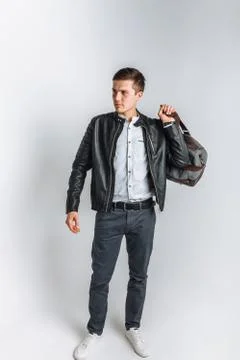Man goes on a journey. The guy in the Studio. The guy in the black jacket. Ha Stock Photos