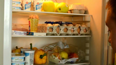 A man goes to look in the fridge. Stock Footage 37267865