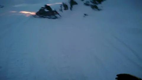 Man goes to a man on a snowmobile Stock-Footage 102161958