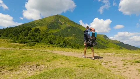 Man goes to mountain. Slow motion 库存影片 211100062
