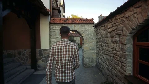 Man goes through the ancient streets Stock Footage 70887271