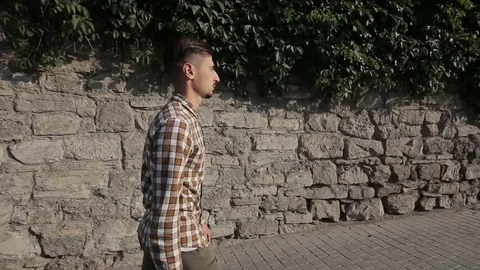 Man goes through the ancient streets Stock Footage 71015300