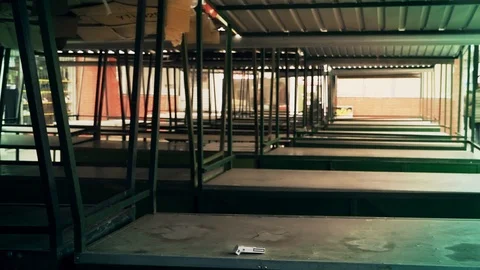 A man goes through an empty market 스톡 동영상 88324692