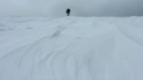 Man goes through the snow at mountain Video stock 72194266