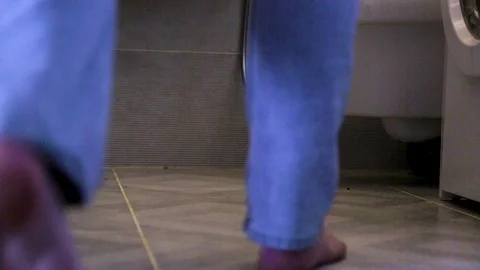 Man Takes Off Pants Stock Footage ~ Royalty Free Stock Videos | Pond5