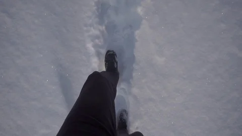 Man goes on the trail in winter Stock Footage 71274405