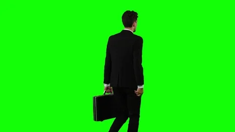 Man goes to work and talks on the phone. Green screen Stock Footage