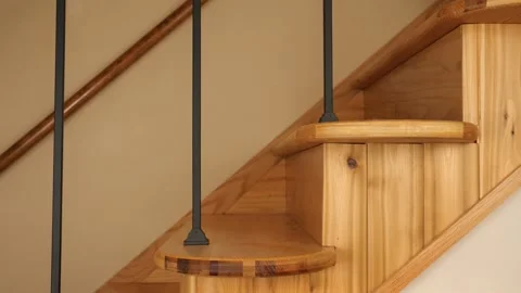 A man going up and down the basement stairs in bare feet Vídeos de archivo 133349669