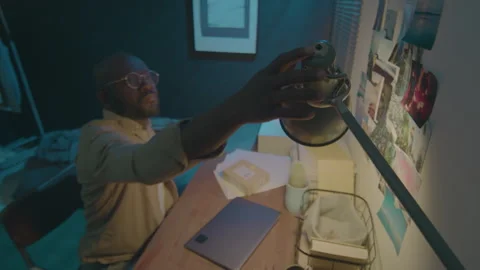 Man Going to Bed at Night after Overworking at Home Stock Footage 256028016