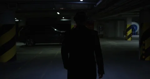 Man going to car in parking Stock Footage 86512074