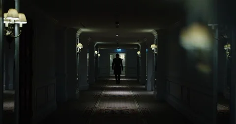 Man going in dark corridor Video stock 86512229