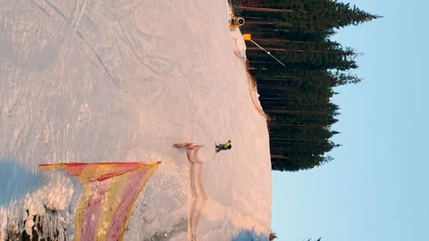 Man going down by winter slope at snowboard Stock Footage 145417343