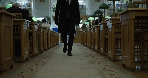 Man going in library Video stock 86512315