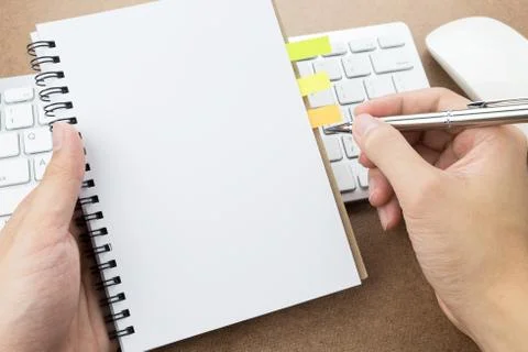 Man is going to take a note. Stock Photos