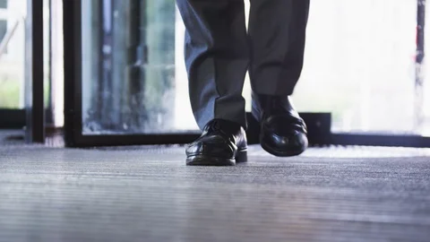 Man going through Revolving Door - Office Entrance - Manager entering Video stock 88947812