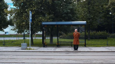 Man going into tram Stock Footage 81704308