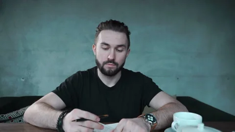 Man is going to write Video stock 86249867