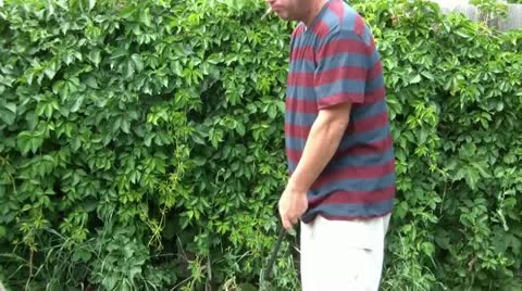 Man Golfing with Cigar 스톡 동영상 12585826