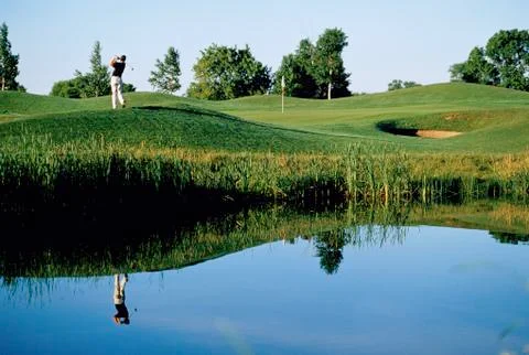 Man Golfing Stock Photos