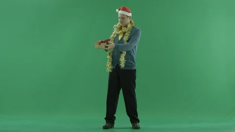 Man got empty gift box for Christmas, green chroma key background Stock Footage 86587289