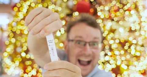 Man got negative COVID-19 antigen test result, laughing and smiling Stock Footage 167028884
