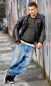 Man in graffiti background Stock Photos