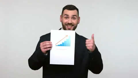 Man graph with statistics, being happy of work results. Stock Footage 159625901