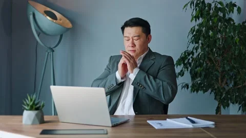 Man grappling with panic attack while struggling to stabilize breathing erratic Stock Footage 275227650