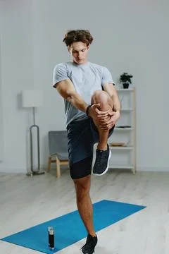 Man gray activity indoor training sporty sport home health lifestyle dumbbells Stock Photos