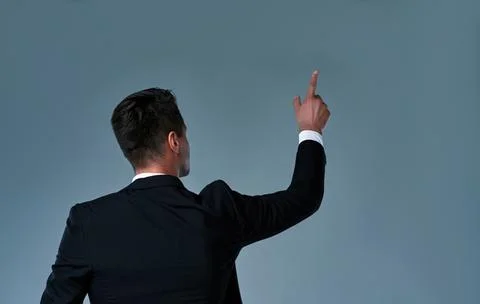 Man on gray background Stock Photos