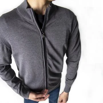 A man in a gray jacket with a lock on a white background Stock Photos