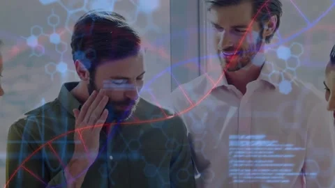 Man in green starting explanation, team leaning in and analyzing code overlay Stock Footage 331005948