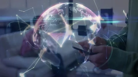Man in green tapping phone, network nodes merging into rotating globe linking Stock Footage 332843739