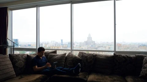 Man Greets using tablet for a video call Stock Footage 103199278