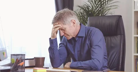 Man with grey hair have a problem at home office 스톡 동영상 61135952