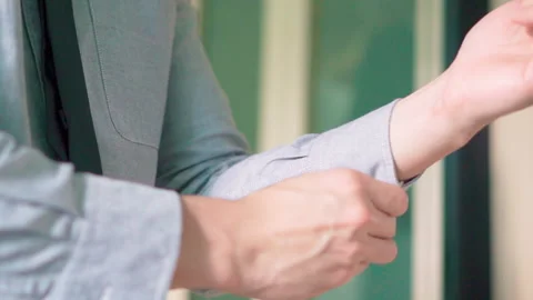 Man grey shirt buttoned the cuff Stock-Footage 158386192