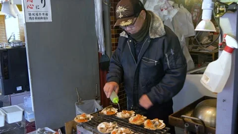 Man Grilling Inside The Biggest Fish Market In Tokyo, Japan Video stock 158991055