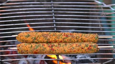 Man grilling kabab on barbecue Stock Footage 58730113