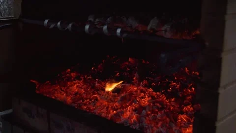 Man grills meat on the grill in winter in the oven on the veranda of a house Stock Footage 148554551