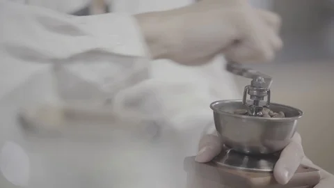 Man grinding coffee in coffee mill horizontal Stock Footage 120492289