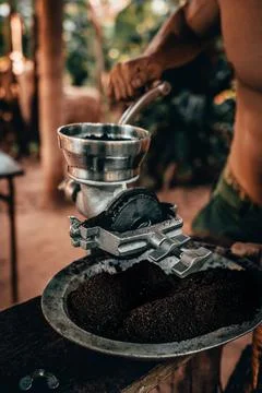 A man grinding coffee Stock Photos